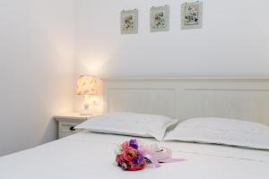 Ein Bett oder Betten in einem Zimmer der Unterkunft Apartments Kala & Kaleta