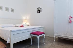 Ein Bett oder Betten in einem Zimmer der Unterkunft Apartments Kala & Kaleta