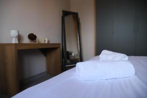 Postel nebo postele na pokoji v ubytování Endrit Accommodation