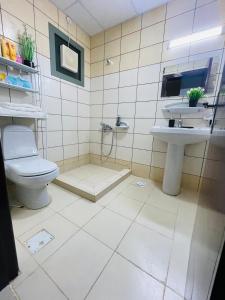 Ένα μπάνιο στο Rak luxury Apartments