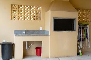 TV a/nebo společenská místnost v ubytování Condomínio Jardins + 258 fotografií