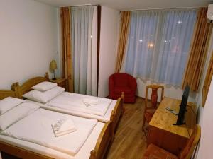 A bed or beds in a room at Hotel ICON