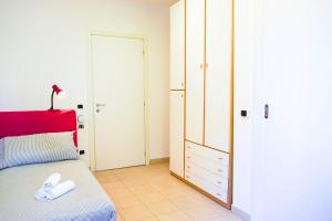 Postel nebo postele na pokoji v ubytování CiaoMi - Hostel & Long Stay - Milano Niguarda & Bicocca