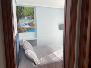 Posteľ alebo postele v izbe v ubytovaní Apartamentos Playa Langosteira