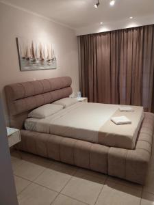 A bed or beds in a room at spyridoula studio