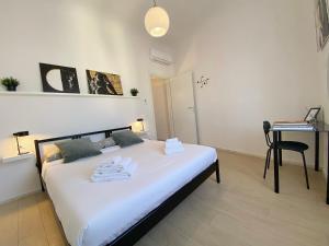 Postel nebo postele na pokoji v ubytování Florence Apartment 10 min dal centro-50 mt tram