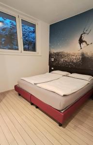Postel nebo postele na pokoji v ubytování Villa Treccani Apartments + 37 fotografií