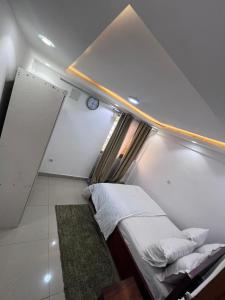 Rúm í herbergi á Apex guest facility