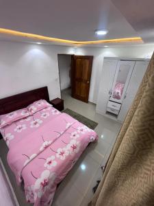 Rúm í herbergi á Apex guest facility