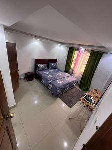 Rúm í herbergi á Apex guest facility