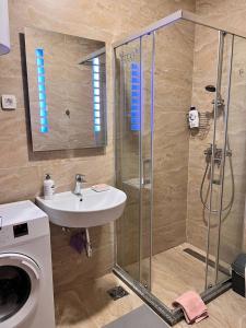 Koupelna v ubytování Pretty apartment near the sea!