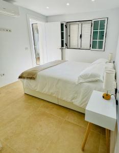 Ένα ή περισσότερα κρεβάτια σε δωμάτιο στο Bungalow Timple 2