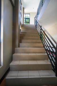 Fotografie z fotogalerie ubytování Super OYO 604 Chateau Cinco Dormitel v destinaci Davao + 34 fotografií