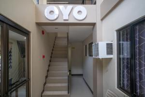 TV a/nebo společenská místnost v ubytování Super OYO 604 Chateau Cinco Dormitel