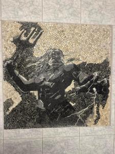 a drawing on the floor of a bathroom at Blue Maizon in Heraklio Town