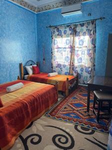 Katil atau katil-katil dalam bilik di AUBERGE ROYAL PALMAS