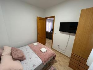 Posteľ alebo postele v izbe v ubytovaní Apartamento compartido - SOLO EL DORMITORIO ES PRIVADO