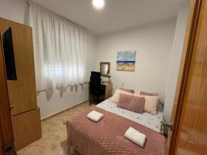 Posteľ alebo postele v izbe v ubytovaní Apartamento compartido - SOLO EL DORMITORIO ES PRIVADO