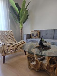 a living room with a coffee table and a couch at Urban Loft - La Conce in Cáceres +18 photos