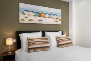 Ένα ή περισσότερα κρεβάτια σε δωμάτιο στο Casa Bonbini II