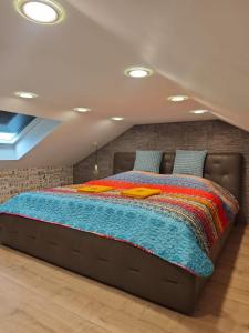 a bedroom with a large bed in a room at Waldoase im Nationalpark Eifel für 4 Personen und max 2 Hunde in Schleiden