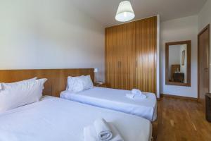 Ένα ή περισσότερα κρεβάτια σε δωμάτιο στο Marina Orada Apartment with Pool - 900m from the Beach +19 φωτογραφίες