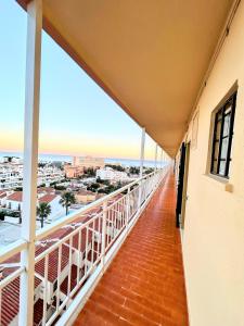 a balcony with a view of the ocean at Luxury studio Torremolinos Costa del Sol in Torremolinos