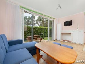 TV a/nebo společenská místnost v ubytování Comfortable holiday homes close to the beach