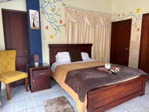 Postel nebo postele na pokoji v ubytování Hotel Casa Santa Lucía