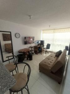 Posezení v ubytování Apartamento Amoblado con Excelente Ubicación