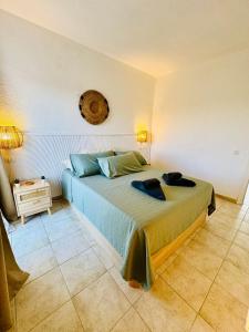 a bedroom with a large bed in a room at Little Gem in Matagorda +37 photos