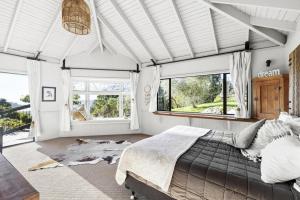 Ένα ή περισσότερα κρεβάτια σε δωμάτιο στο Bali Bliss Villa