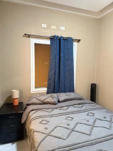 Postel nebo postele na pokoji v ubytování 5 minutos de UNITEC Apartamento completo de un cuarto