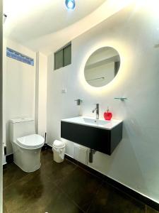 a bathroom with a sink and a toilet at Hotel Churup in Huaraz +82 photos