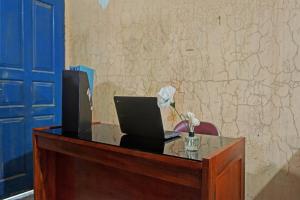 Μια τηλεόραση ή/και κέντρο ψυχαγωγίας στο Hotel O Sweet Candy 1 Syariah