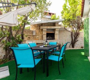 Patio alebo iná vonkajšia časť ubytovania Apartments Kike