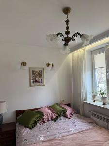 Postel nebo postele na pokoji v ubytování Apartament Antique Pruszków Centrum