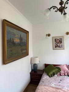 Postel nebo postele na pokoji v ubytování Apartament Antique Pruszków Centrum