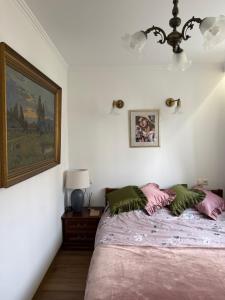 Postel nebo postele na pokoji v ubytování Apartament Antique Pruszków Centrum