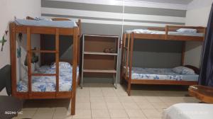 Postel nebo postele na pokoji v ubytování Brisas del Mar