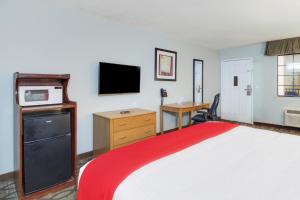 Postel nebo postele na pokoji v ubytování OYO Hotel Ingleside TX