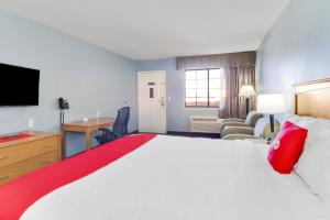 Postel nebo postele na pokoji v ubytování OYO Hotel Ingleside TX