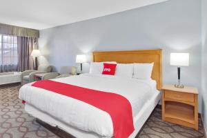 Postel nebo postele na pokoji v ubytování OYO Hotel Ingleside TX