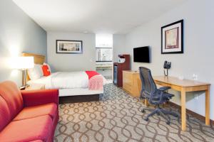 TV a/nebo společenská místnost v ubytování OYO Hotel Ingleside TX