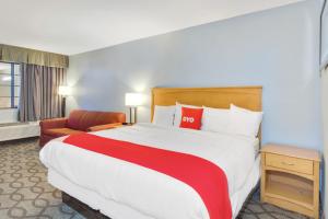 Postel nebo postele na pokoji v ubytování OYO Hotel Ingleside TX