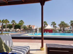 a view of the pool at a resort at Coral Reef in Santa Maria