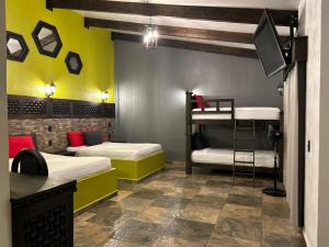 Ένα ή περισσότερα κρεβάτια σε δωμάτιο στο Hotel Villas Camargo +1 φωτογραφίες