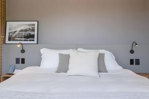 Katil atau katil-katil dalam bilik di Apartamento com Ofurô Vale dos Vinhedos
