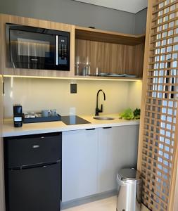 Dapur atau dapur kecil di Apartamento com Ofurô Vale dos Vinhedos
