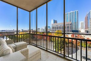 a balcony with a view of a city skyline at Stylish 1-Bedroom Condo Downtown Atlanta in Atlanta